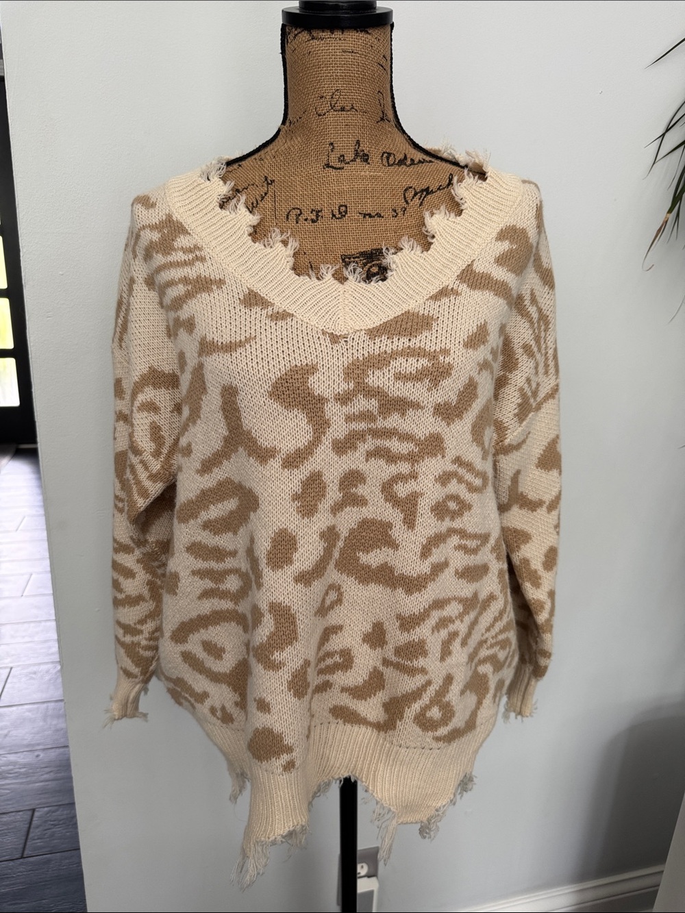Distressed V-Neck Animal-Print Sweater in Beige and Cream